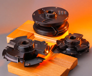 Sets of cutter heads for making doors